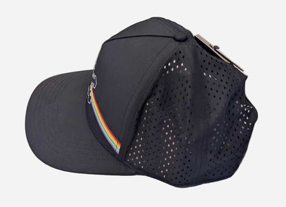 Black baseball cap with rainbow detail on a light gray background